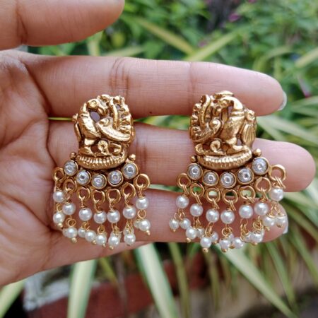 Peacock stud with cluster pearl drops