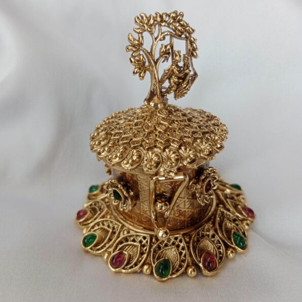 Intricately designed Krishna kumkum box