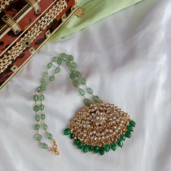 Exquisite Jadau peacock pendant with original Aventurine bead chain