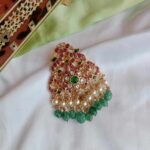 Ethnic dual peacock Jadau pendant with pearl and green bead drops