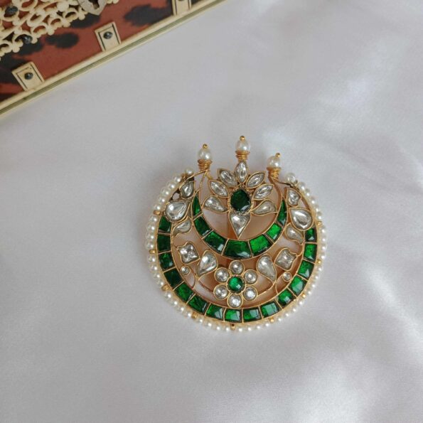 Exclusive green Jadau moon pendant