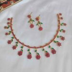 Mesmerising flower ruby emerald set