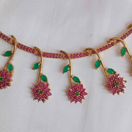 Mesmerising flower ruby emerald set