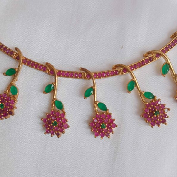 Mesmerising flower ruby emerald set