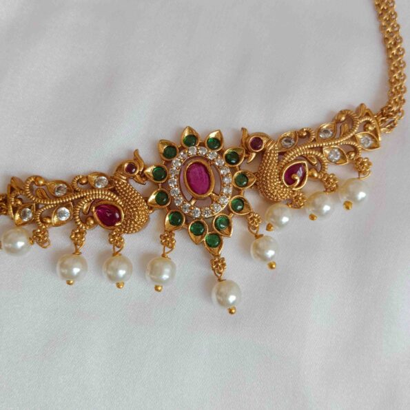 Traditional peacock choker