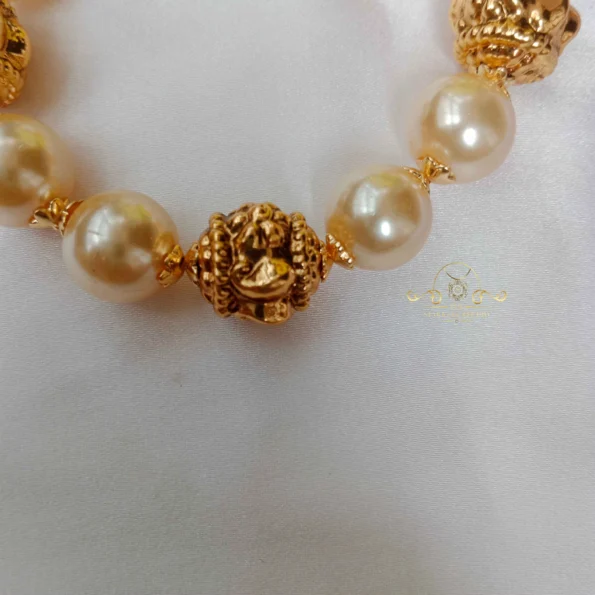 Adjustable Pearl and Antique Bead Bracelet