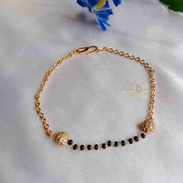 Black Bead and Gold Bracelet