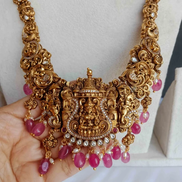 Intricately Designed Lakshmi Haram with Red Bead Drops