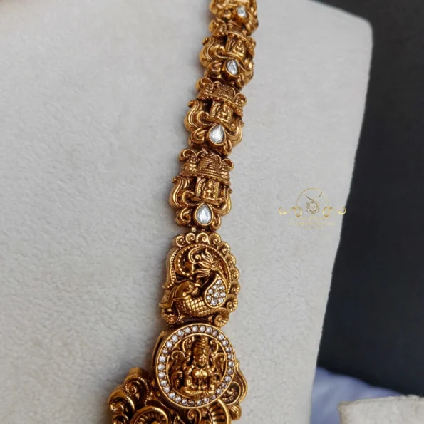 Intricately Designed Lakshmi Haram with Red Bead Drops