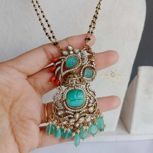 Black Beads with Peacock Victorian Pendant