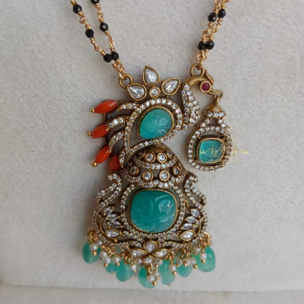 Black Beads with Peacock Victorian Pendant