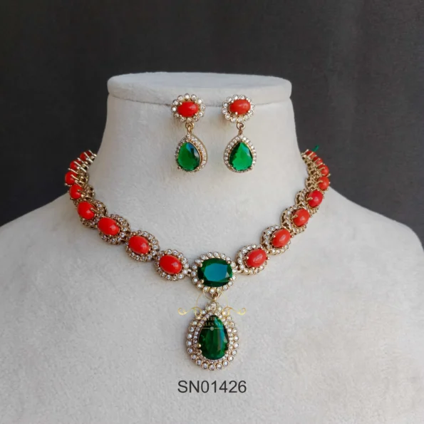 Elegant Coral Necklace with Emerald in Middle