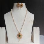 Peacock Pendant in Long Pearl Chain