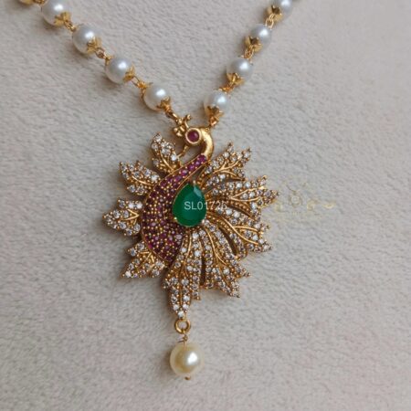 Peacock Pendant in Long Pearl Chain