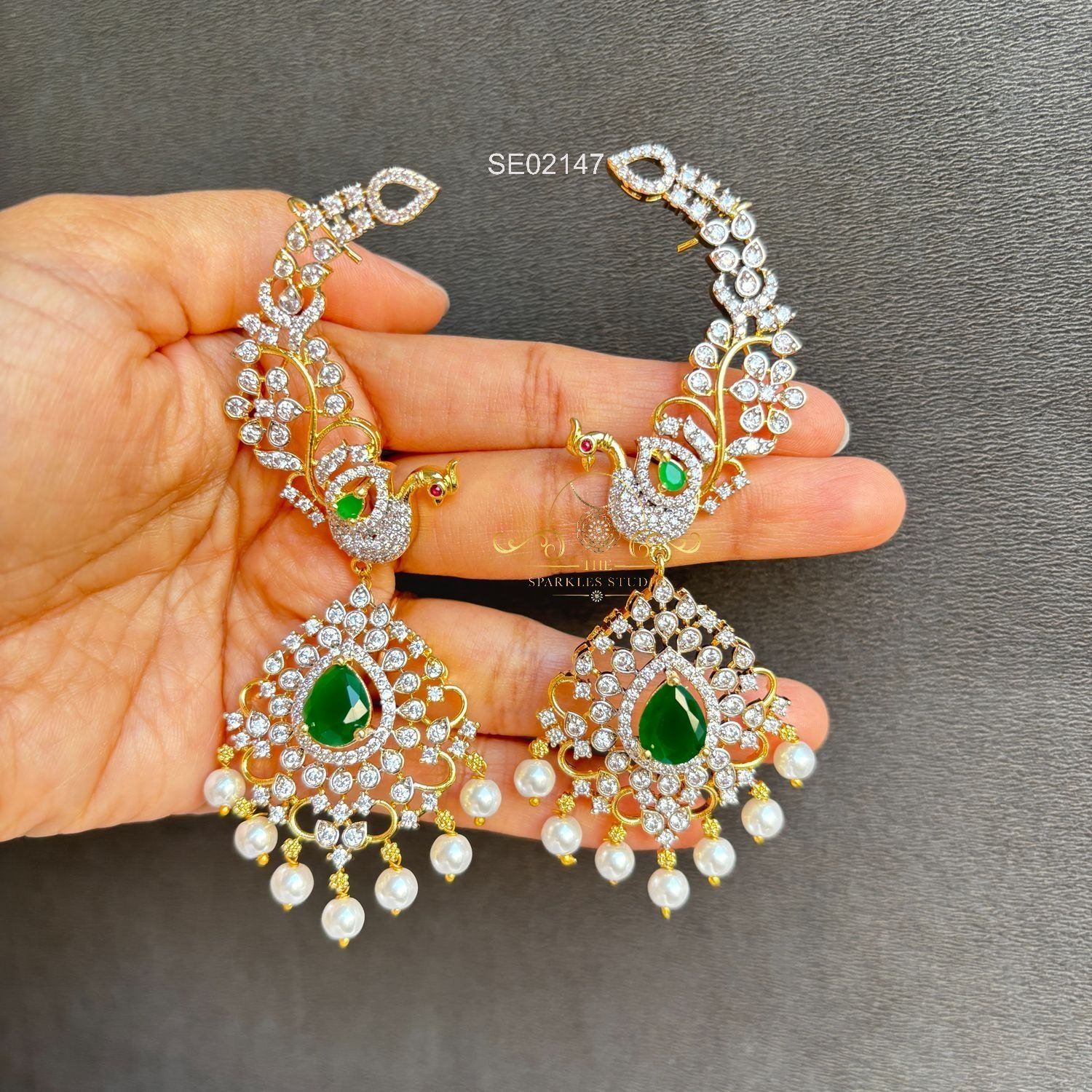 2147_1_1.webp peacock AD Earcuffs