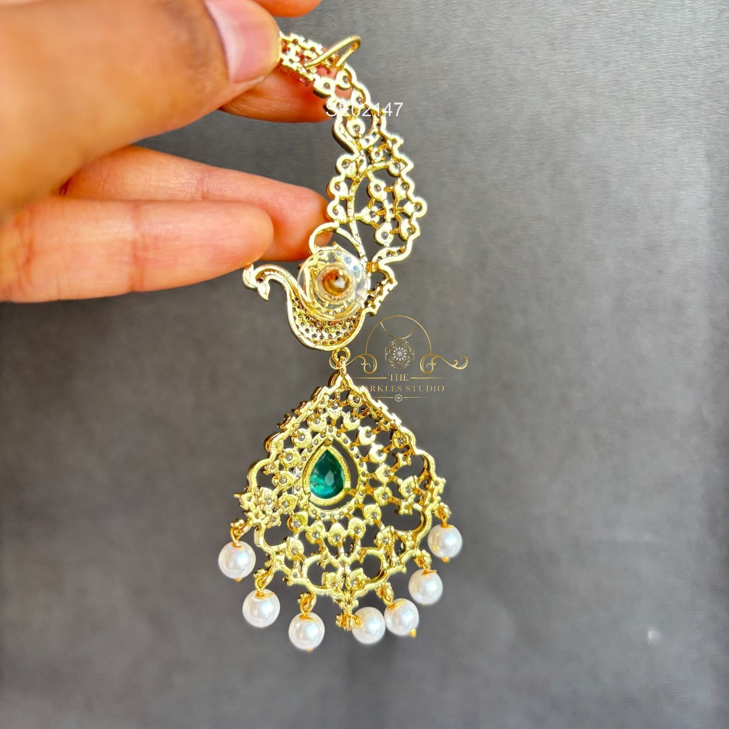 2147_2_3.webp peacock AD Earcuffs